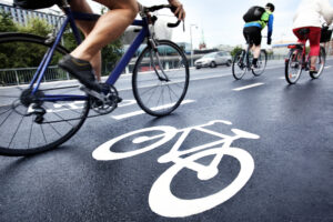 Bicycle Accident Lawyer, Coral Springs, FL with cyclists going down the road