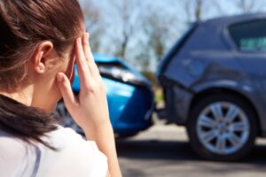 Car Accident Lawyer Coral Springs, FL with a shattered windshield of a car